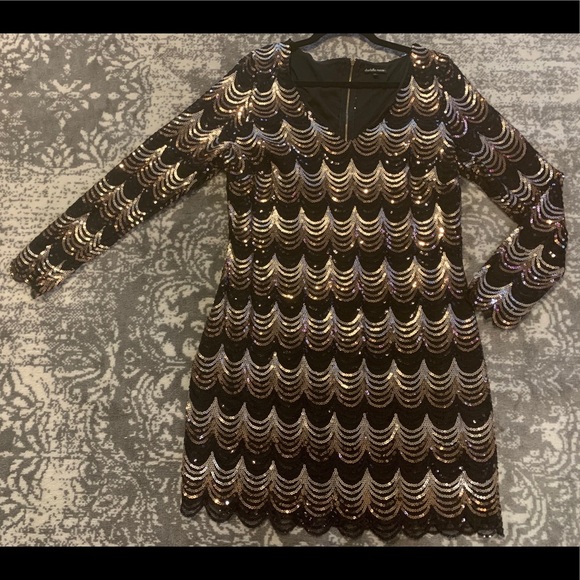 Scalloped, sequin, zipper dress.
